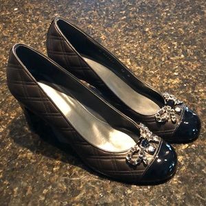 Stuart Weitzman black quilted pumps